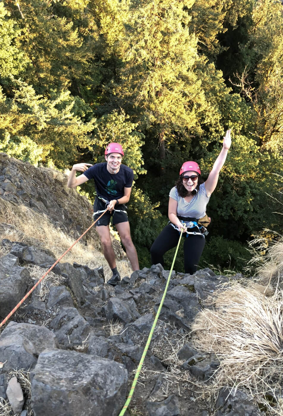 A duo enjoying their rock climbing experience.