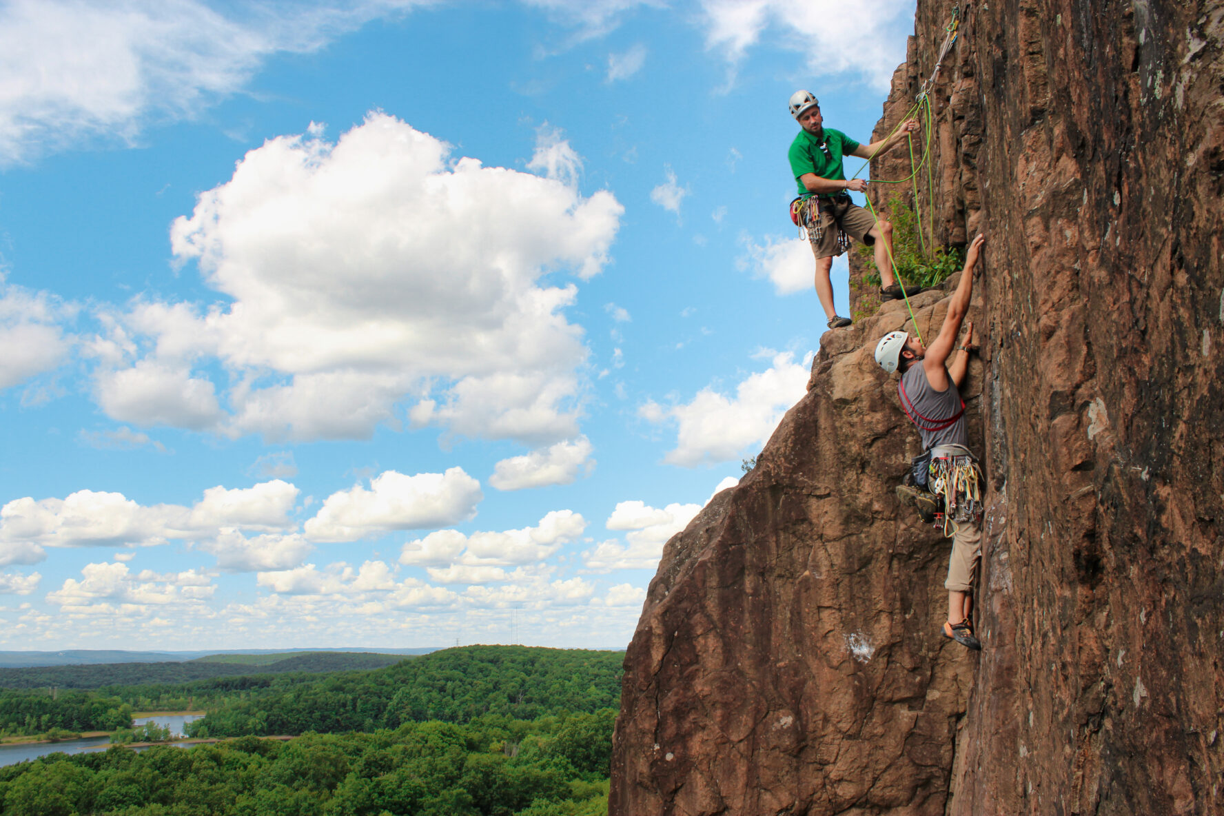 A person rock climbing in Ragged Mountains
