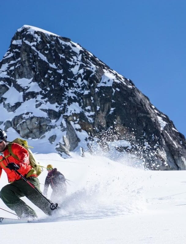 Incredible downhill run with a mountain as a backdrop