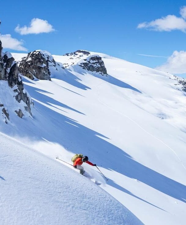 Incredible downhill run with a mountain as a backdrop