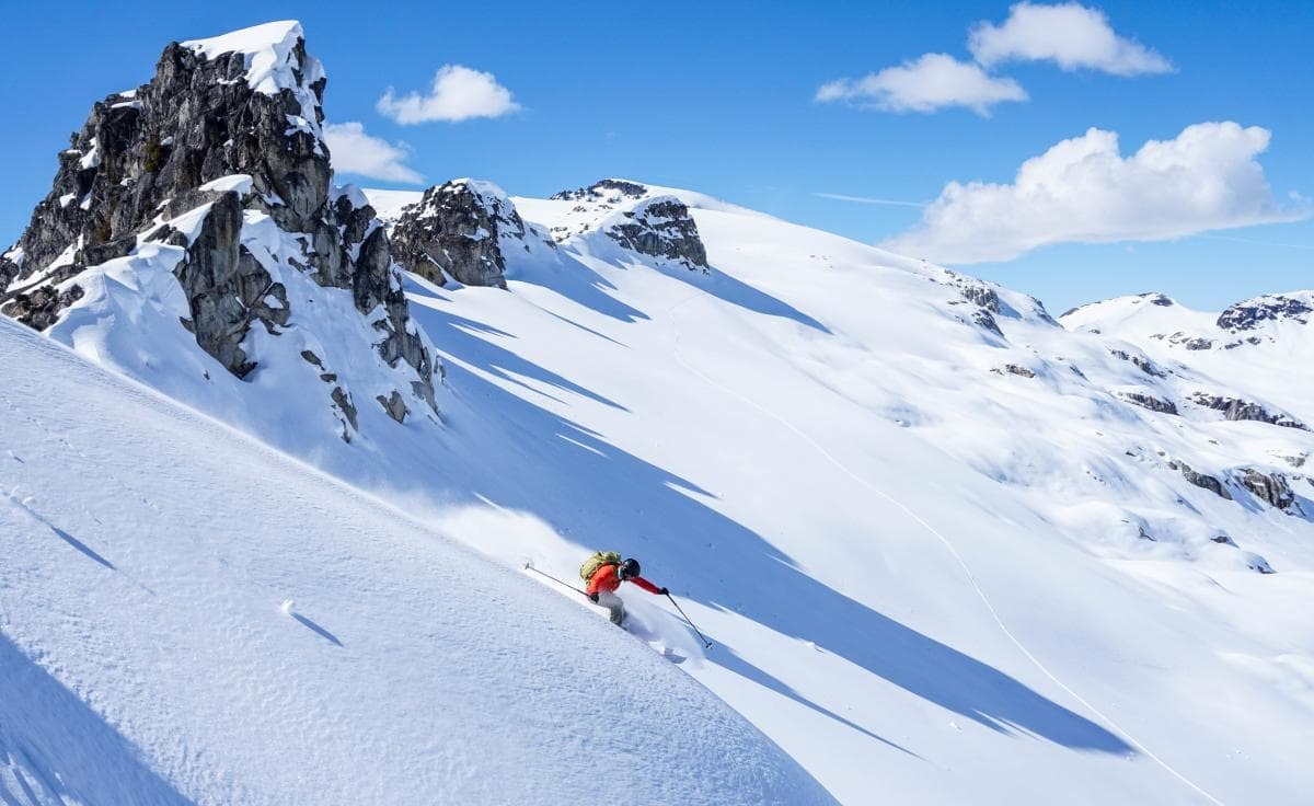 Incredible downhill run with a mountain as a backdrop