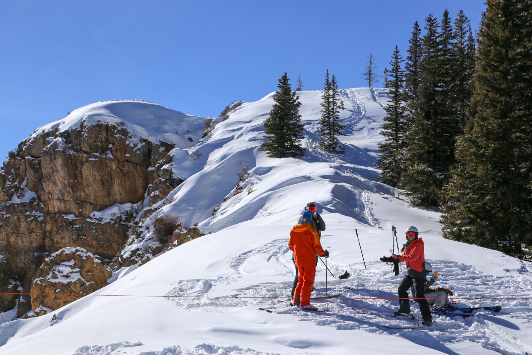 A ski crew psyched to hit some backcountry slopes around Aspen.