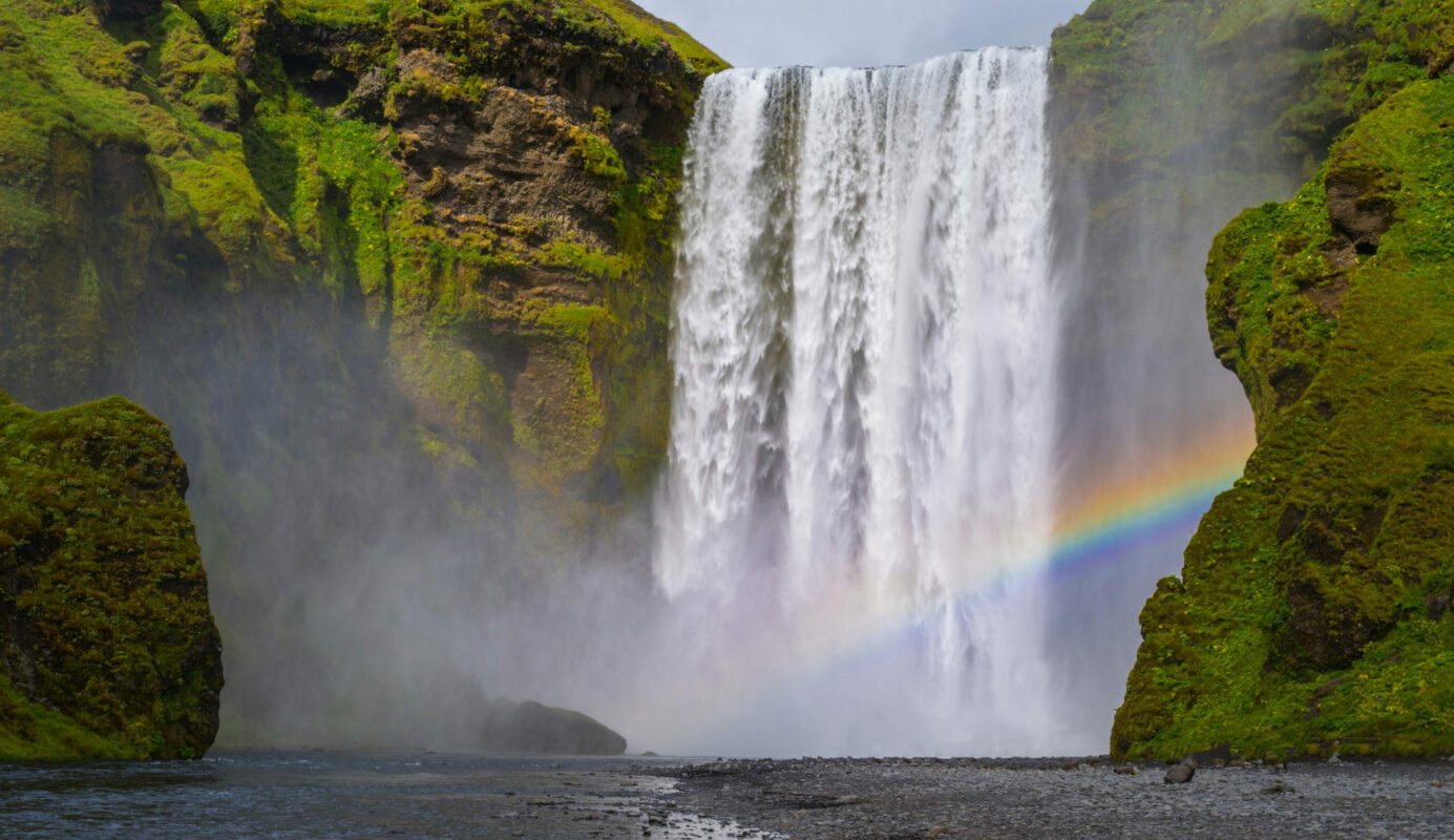 Stop by the impressive Skógafoss waterfall along the way