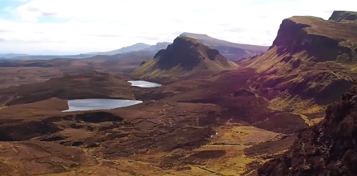 Dark reds and browns adorn the coast of Scotland