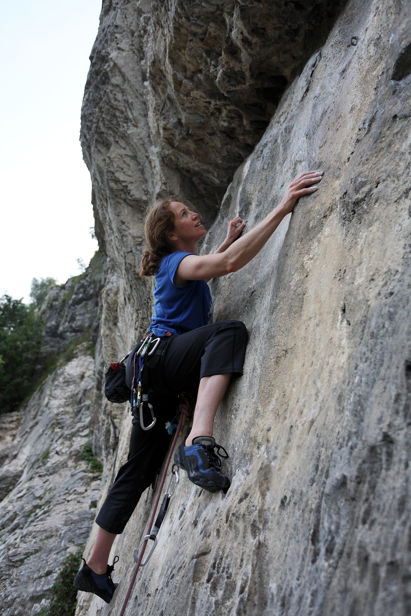 A female climber in the Italian Dolomites