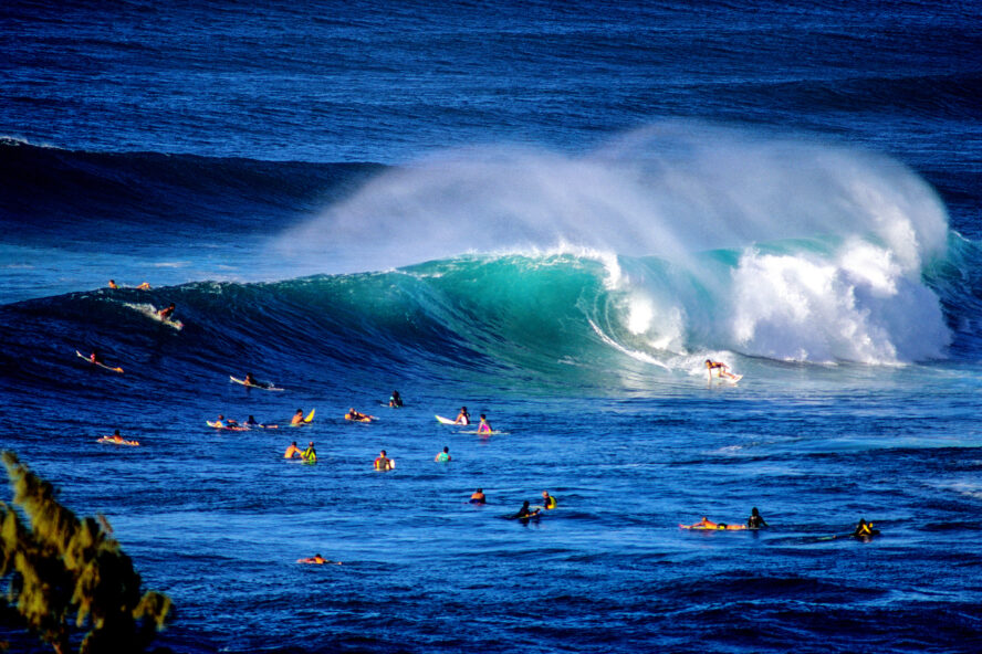 Surfing at Sunset Beach on the North Shore of Oahu, Hawaii.