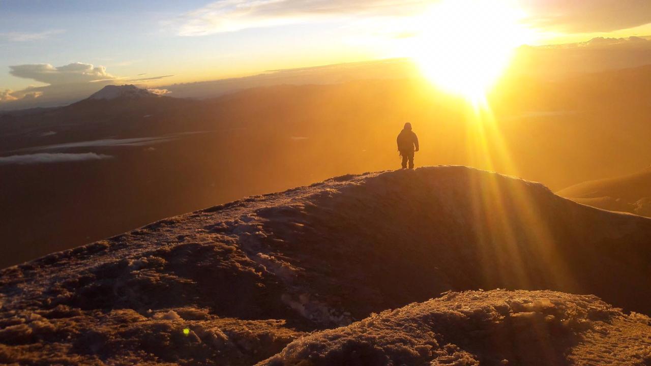 Enjoy the spectacular sunset as you summit the majestic Cayambe
