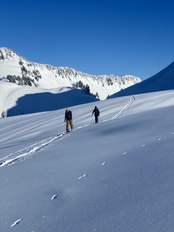 Hikers toward Easton glacier on the souther flank of Mt Baker - 10,781 ft. This image is taken on the Railroad Grade trail, Washington State.