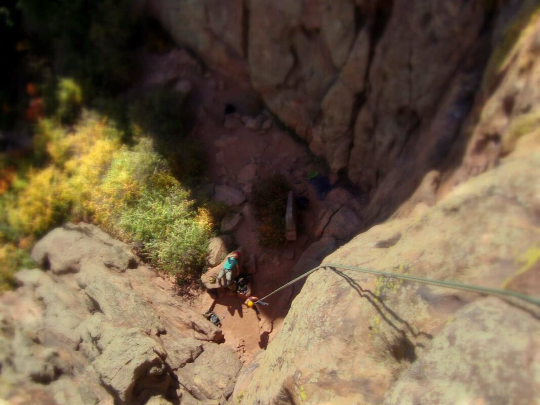 Women rock climbing a crag in Colorado 
