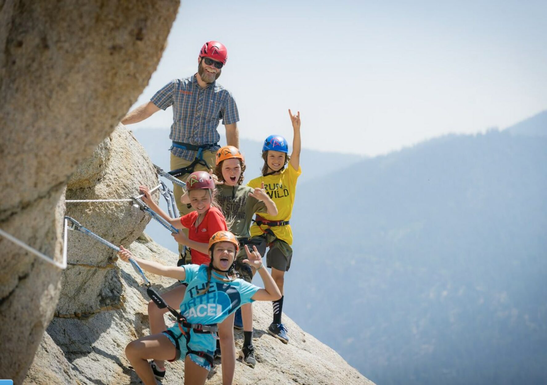 Children climbing Via Ferrata in Lake Tahoe