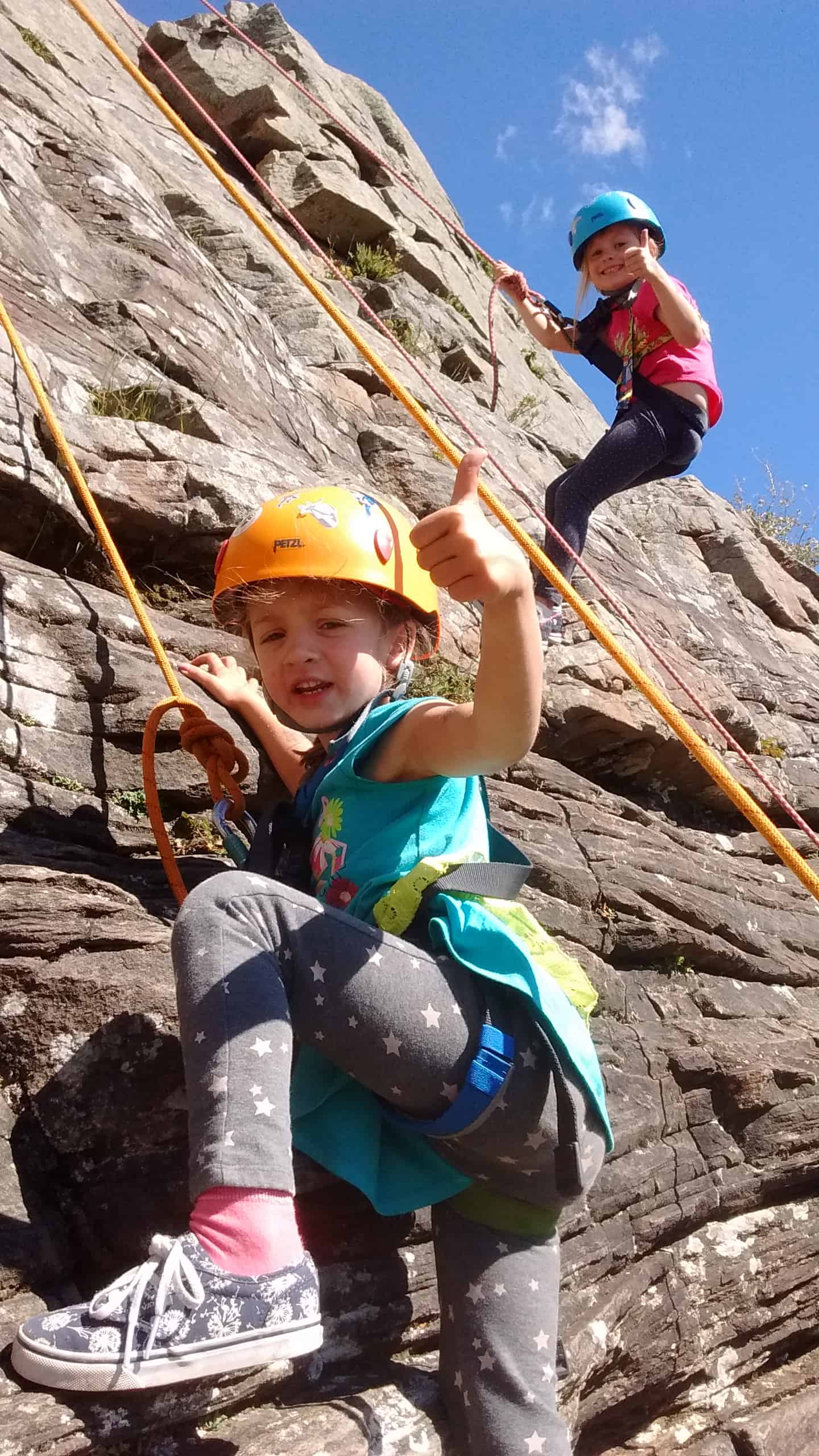 Girls rock climbing in the Canadian Rockies