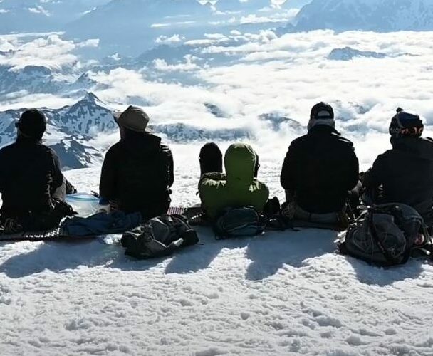 Hikers toward Easton glacier on the souther flank of Mt Baker - 10,781 ft. This image is taken on the Railroad Grade trail, Washington State.
