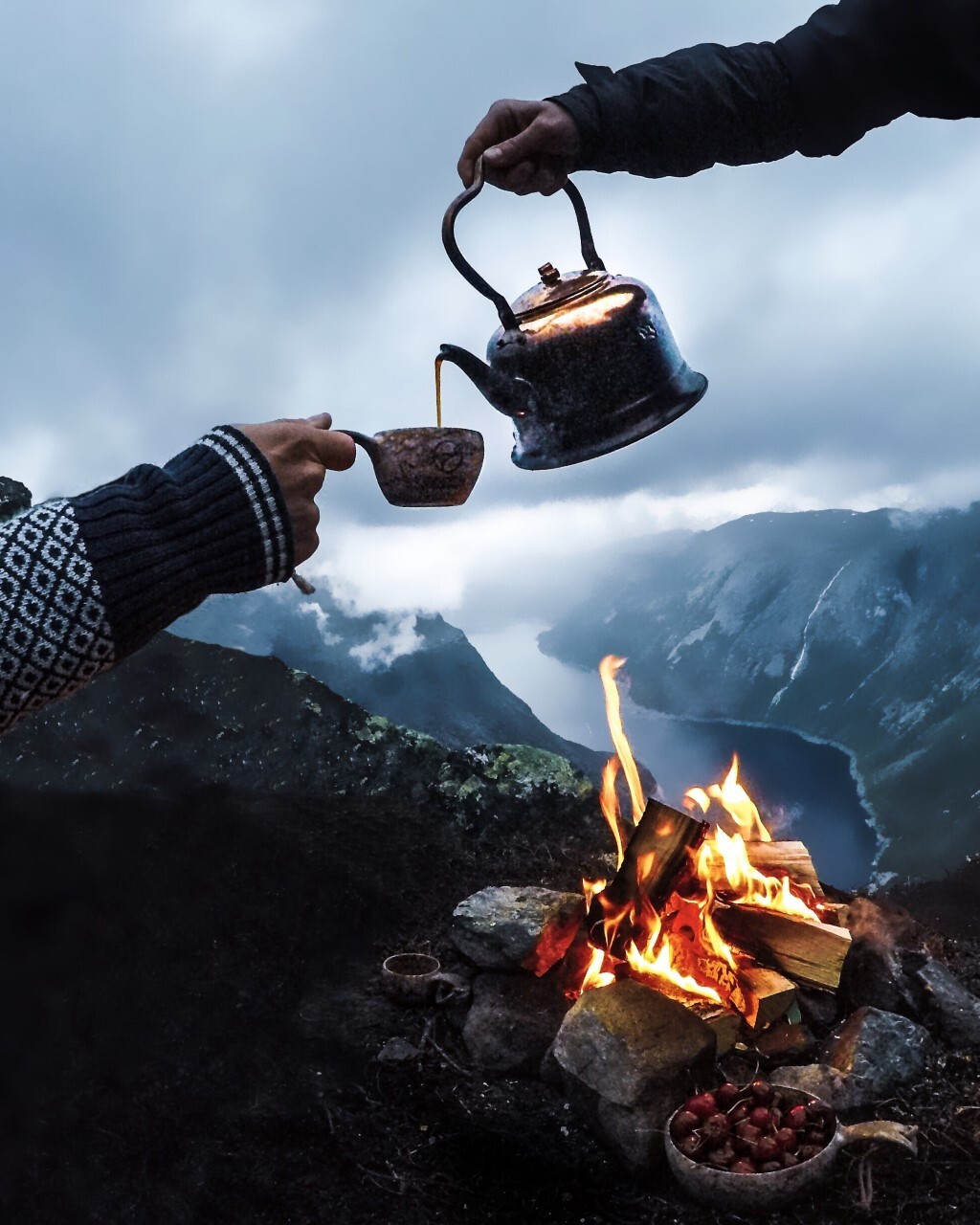 Pouring coffee at Trolltunga, Norway