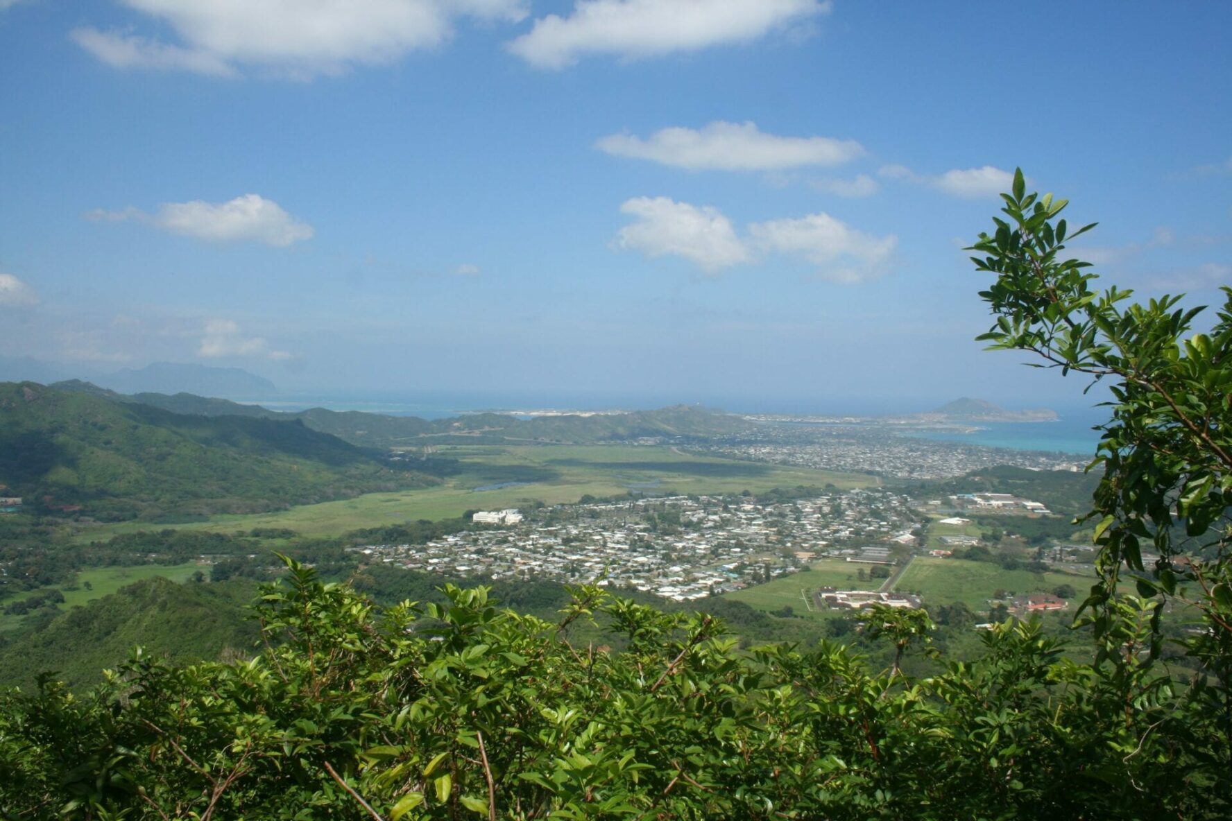 Hiking trail overlooking a city in Hawaii