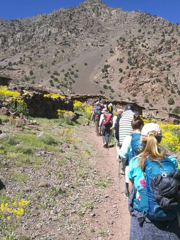 Toubkal national park in springtime with mount, cover by snow and ice, Refuge Toubkal, start point for hike to Jebel Toubkal, – highest peak of Atlas mountains and Morocco