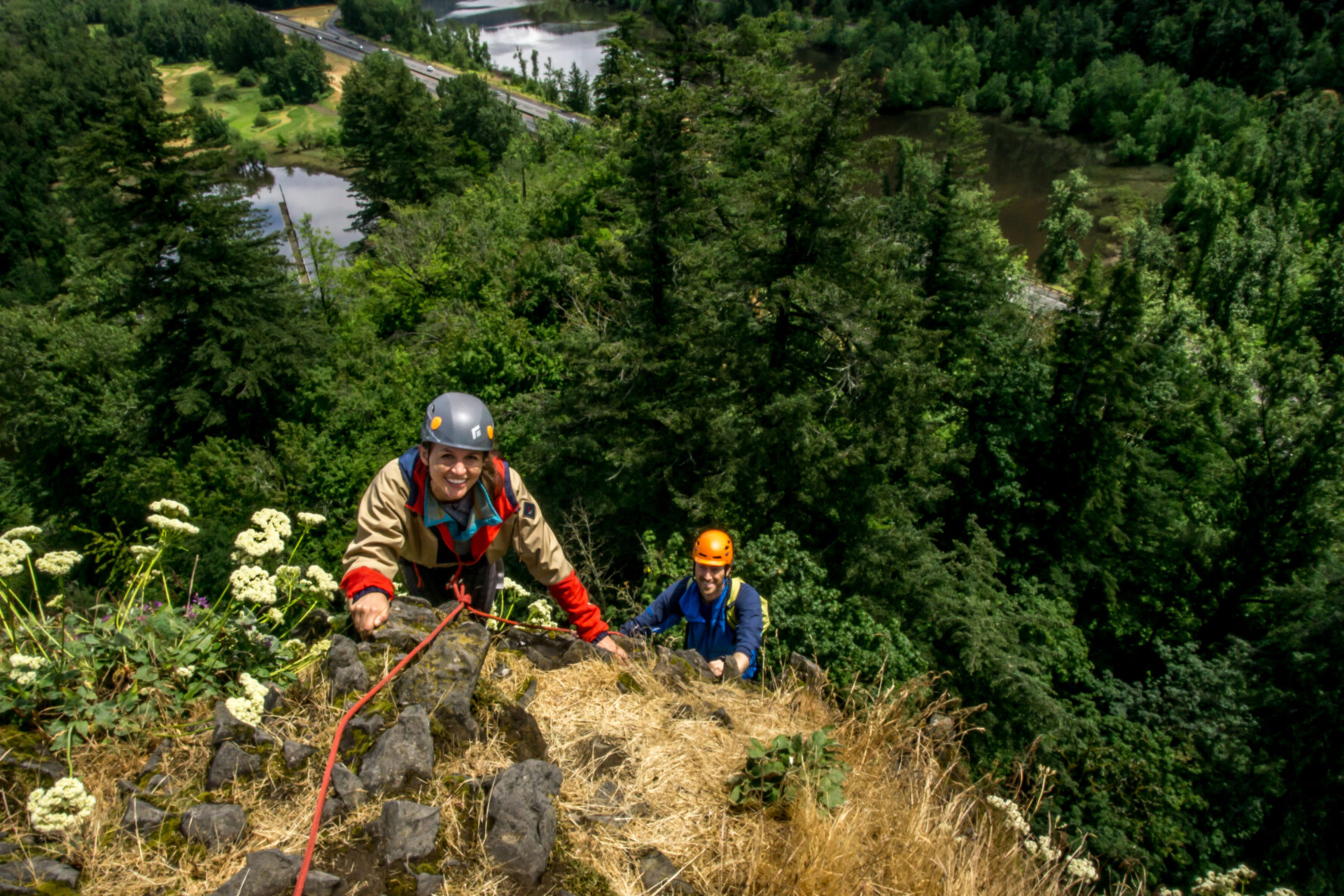 People Rock Climbing in Rooster Rock State Park