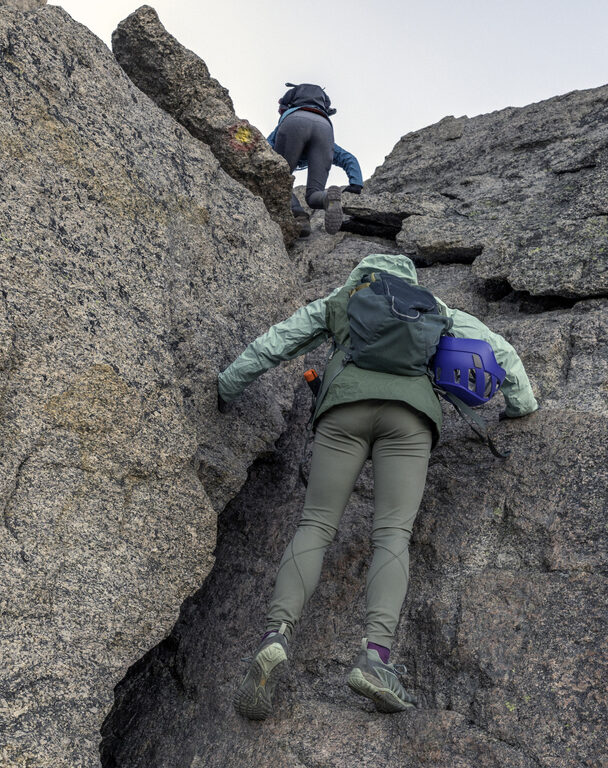 Longs Peak with trail map scene guiding your way many people die climbing this mountain. Estes Park , Colorado is near the Long Peak many many people attempt to climb this Peak and some do not survive. This shows the peak in Summer on a perfect day to climb. A colorado 14er