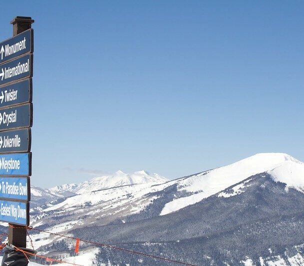 Avalanche Education in Crested Butte, a man measures snow