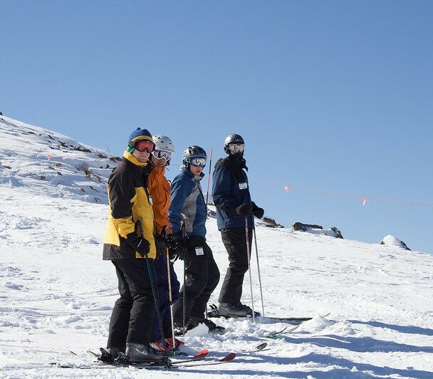 Avalanche Education in Crested Butte, a man measures snow