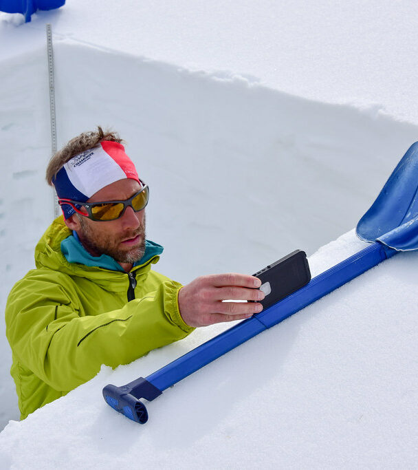 Skiers learning about the avalanche