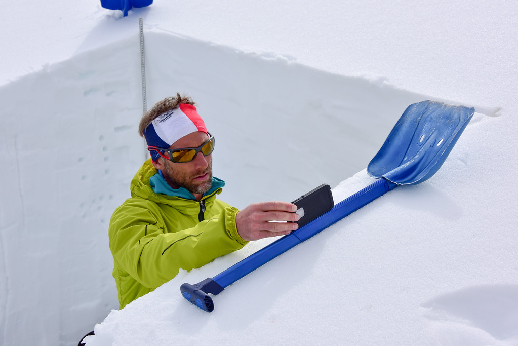 Man learning about avalanche on an AIARE Refresher course in Crested Butte