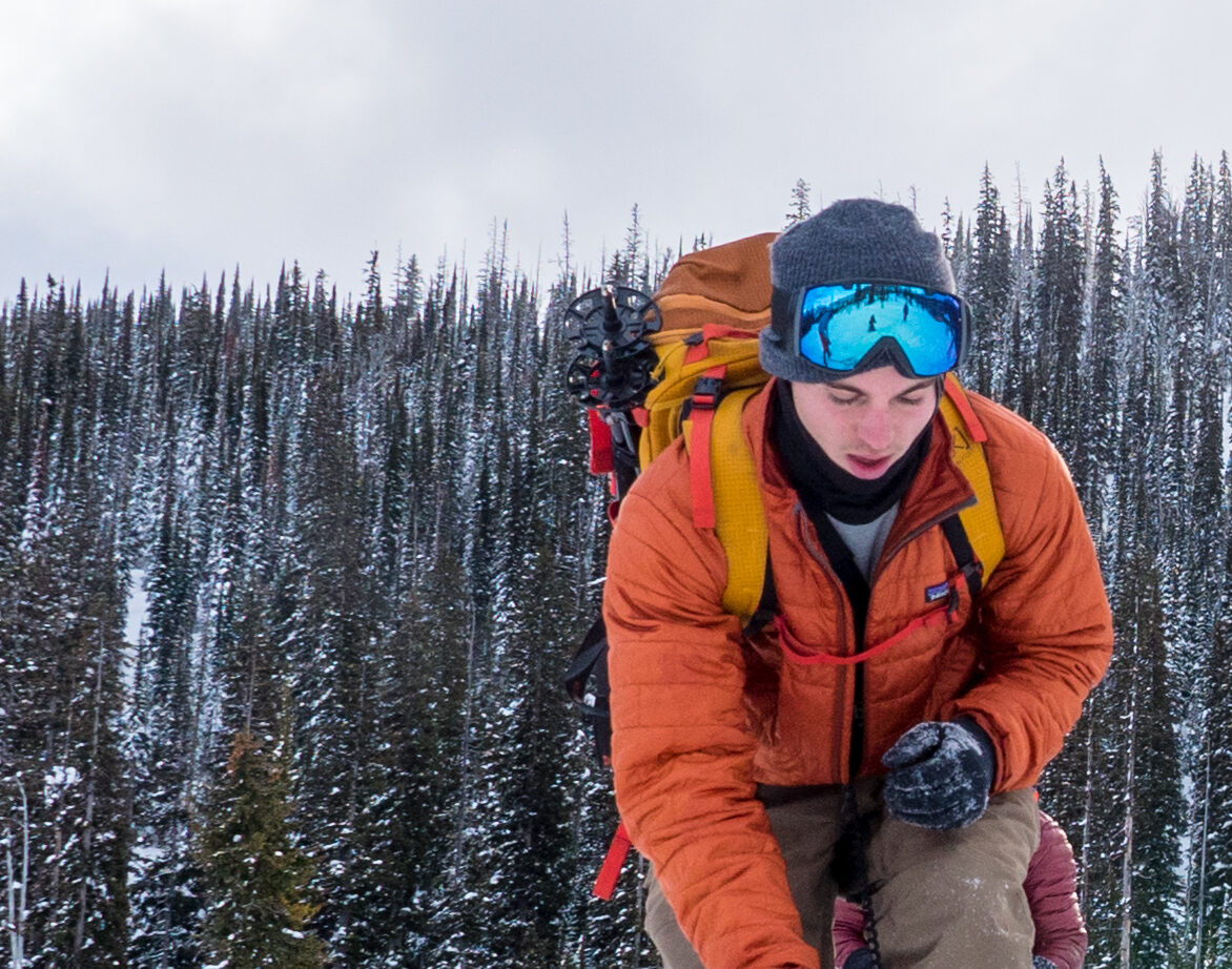 Climbing through the snowy terrain