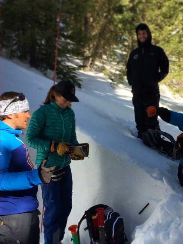 Participants learning about avalanche awareness in RMNP