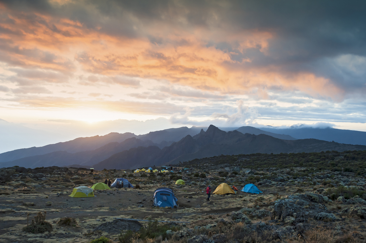 "Sunset at the Shira Camp on Machame route on the ascent of Mount Kilimanjaro. Shira is one of the three volcanic cones of Kilimanjaro, the other ones are Mawenhi and Kibo, which is the actual summit of Mount Kilimanjaro, with 5.895 m Africas highest mountain as well as worlds highest free-standing mountain. See related images:"
