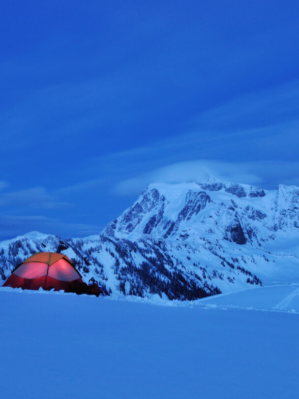 Hikers toward Easton glacier on the souther flank of Mt Baker - 10,781 ft. This image is taken on the Railroad Grade trail, Washington State.