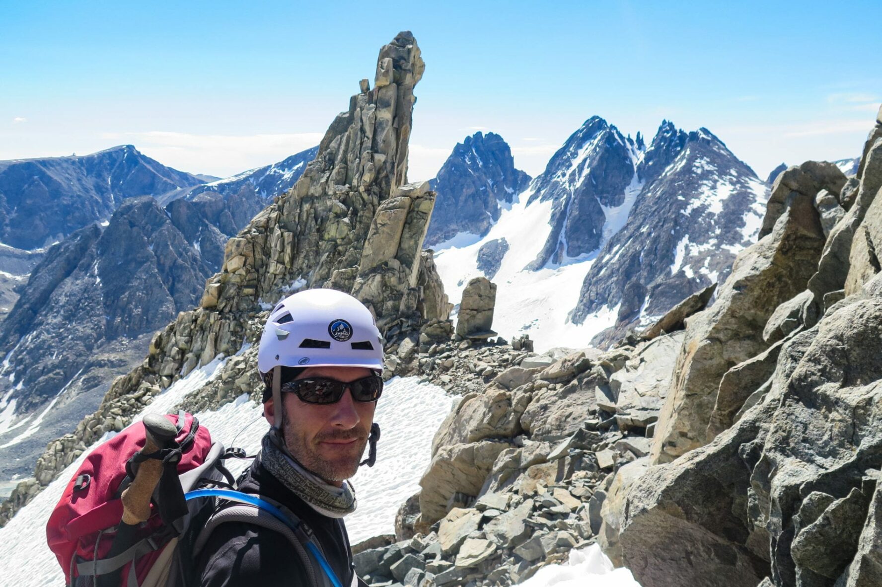 A happy climber on top of the Gannett Peak