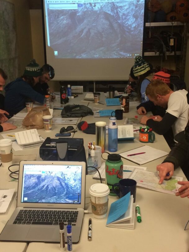 Participants learning about avalanche awareness in RMNP