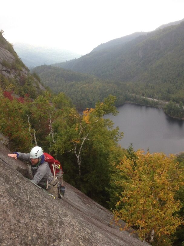 A woman climbing a cliff in Connecticut