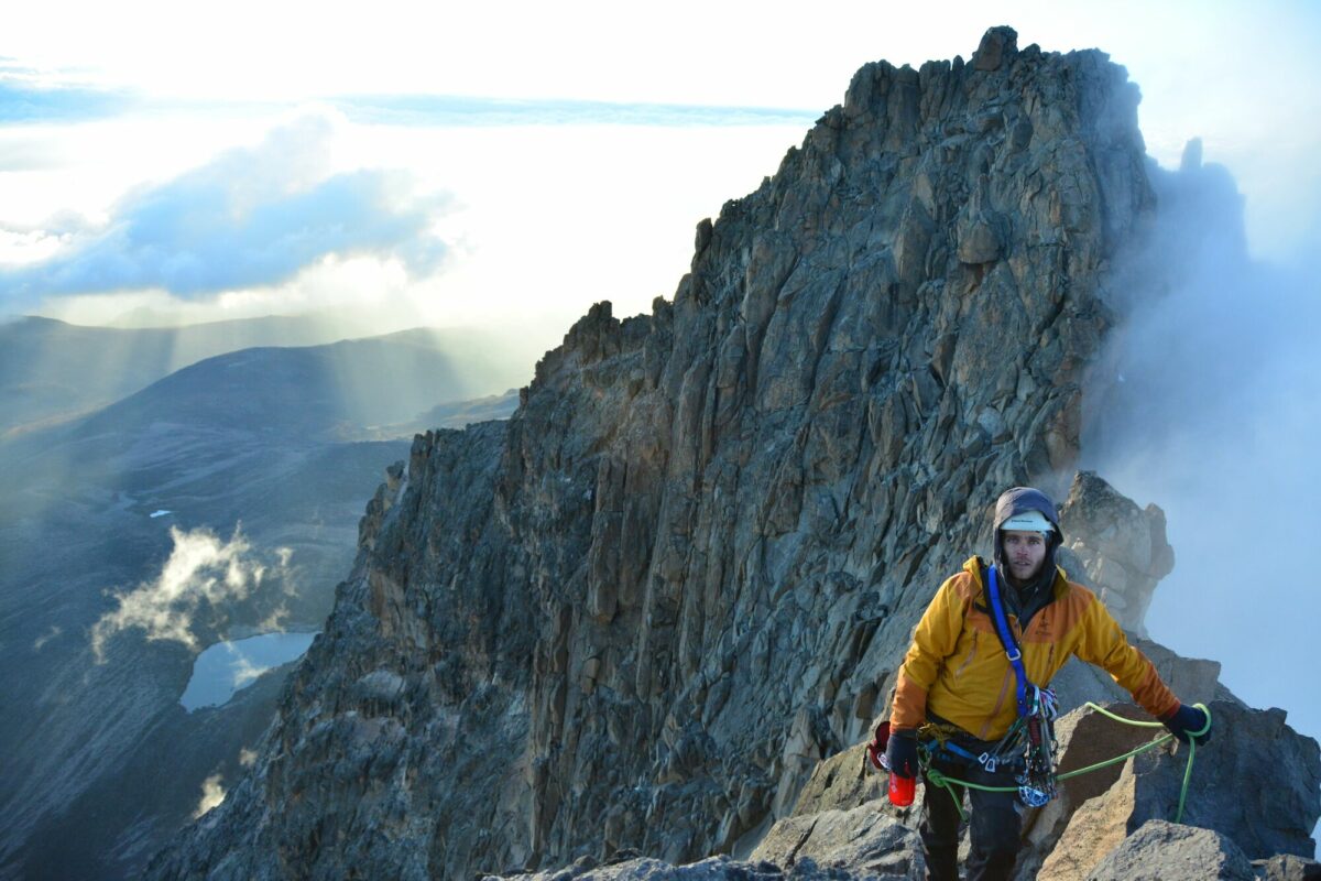 A climber taking a picture near the Batian summit