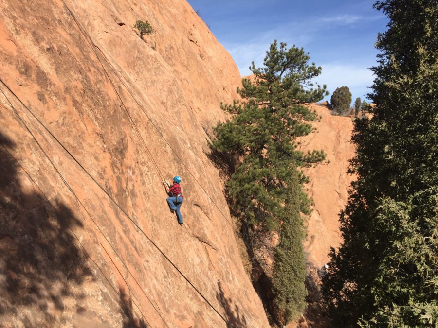 A lone climber on a cliff in the Garden of the Gods