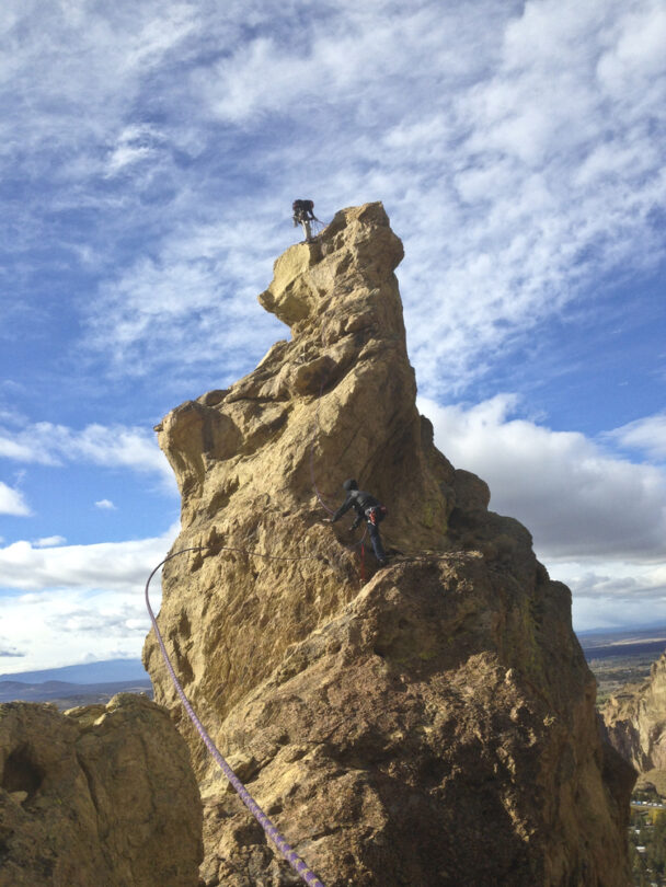 A woman climbing a cliff in Connecticut