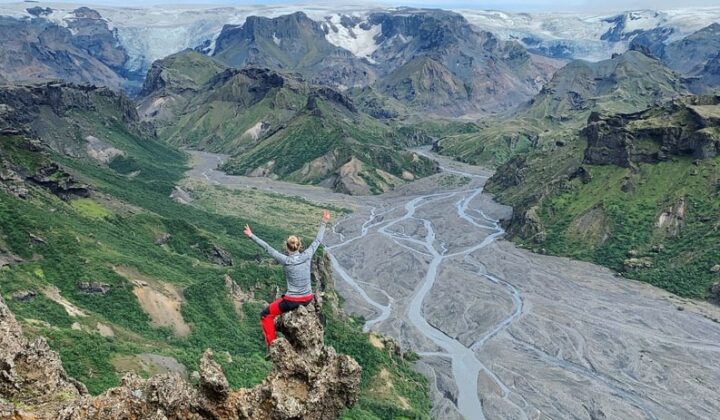 Hiker posing as the rivers and Thorsmork valley lie in the background