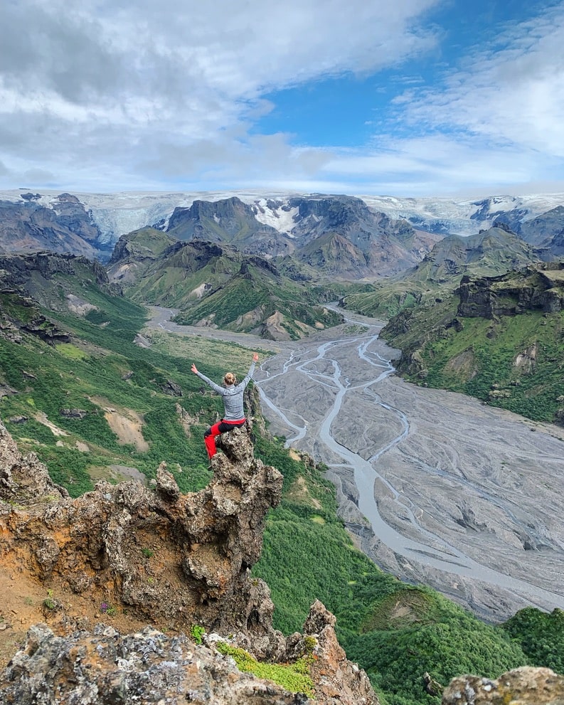 Hiker posing as the rivers and Thorsmork valley lie in the background