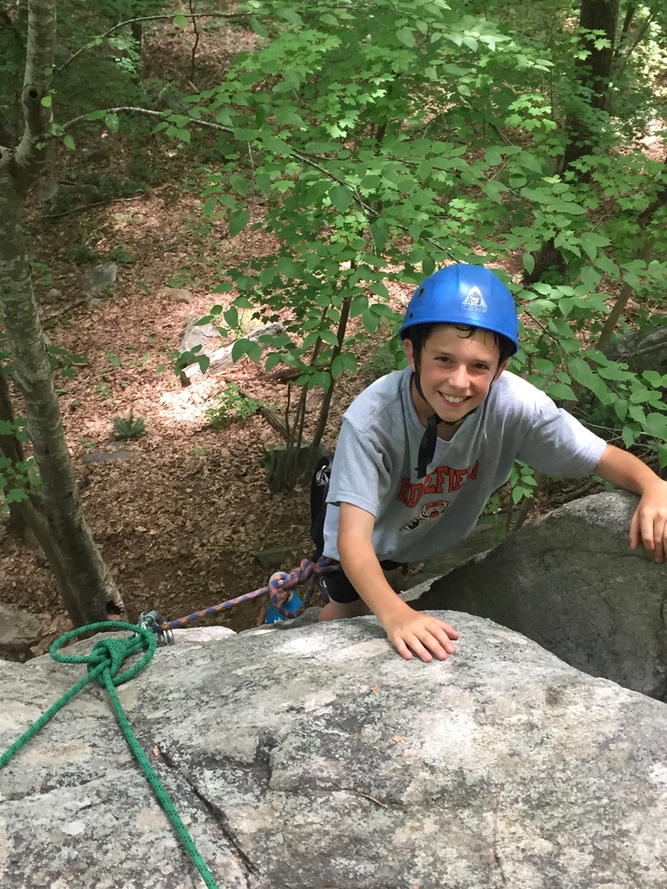 A young kid climbing Kent
