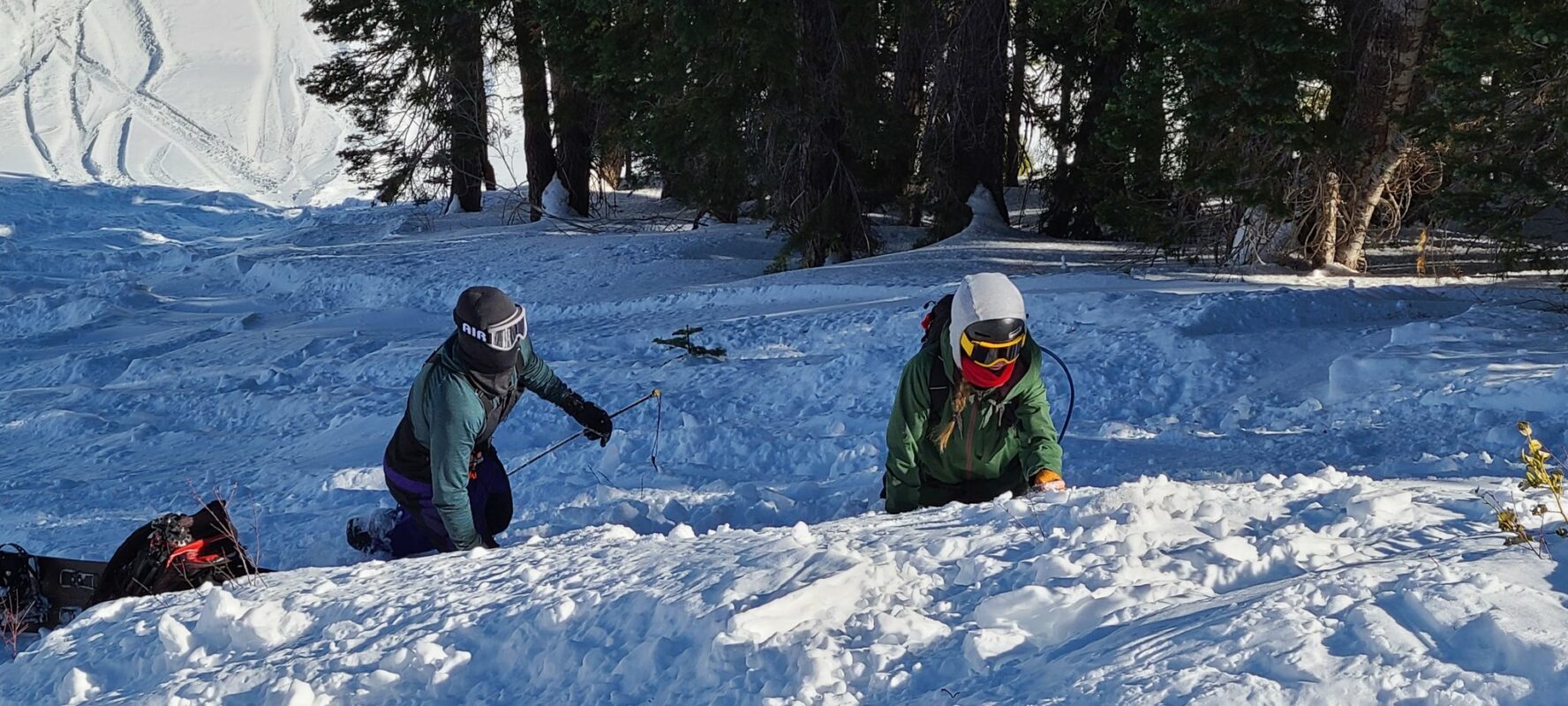 Digging a hole in an AIARE course on Lake Tahoe