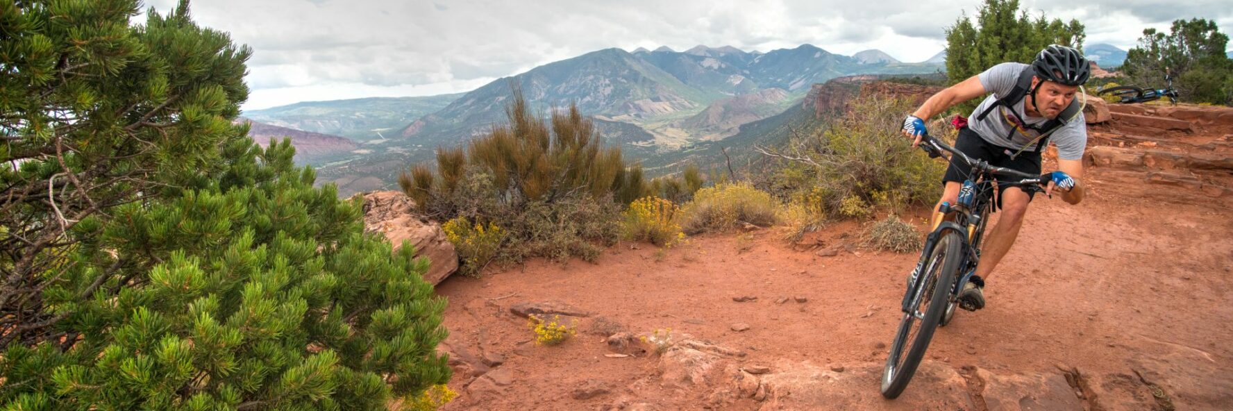 A rider on a trail in Porcupine Rim