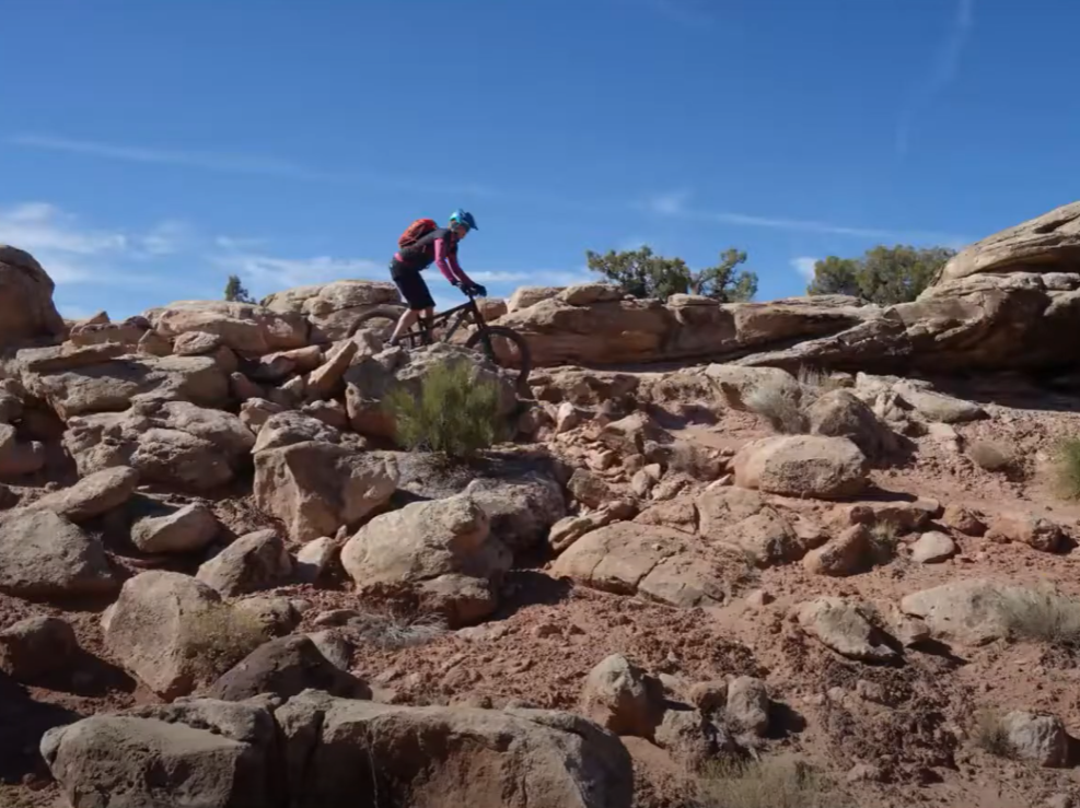 The trails here are not highly technical, but they are far from trivial. Areas such as Baby Steps and Dino Flow offer speedy and flowy dirt sections through rock outcroppings and down tiny drainages, while Mega Steps’ uphill climb on mixed slickrock will challenge your endurance.