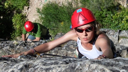 A woman climbing La Pedriza.