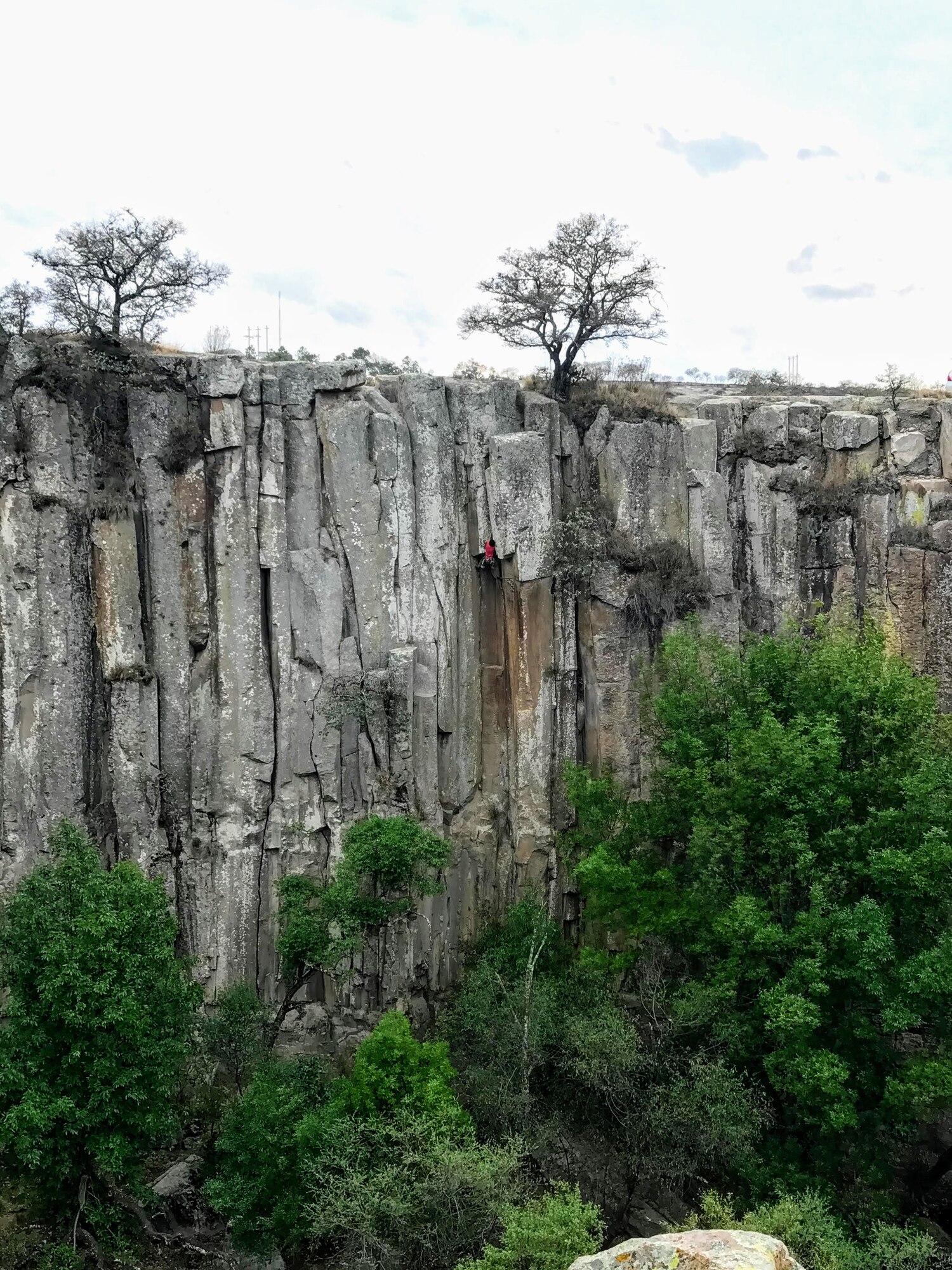 Spot the climber on a mean 5.10+ overhanging off width at Aculco
