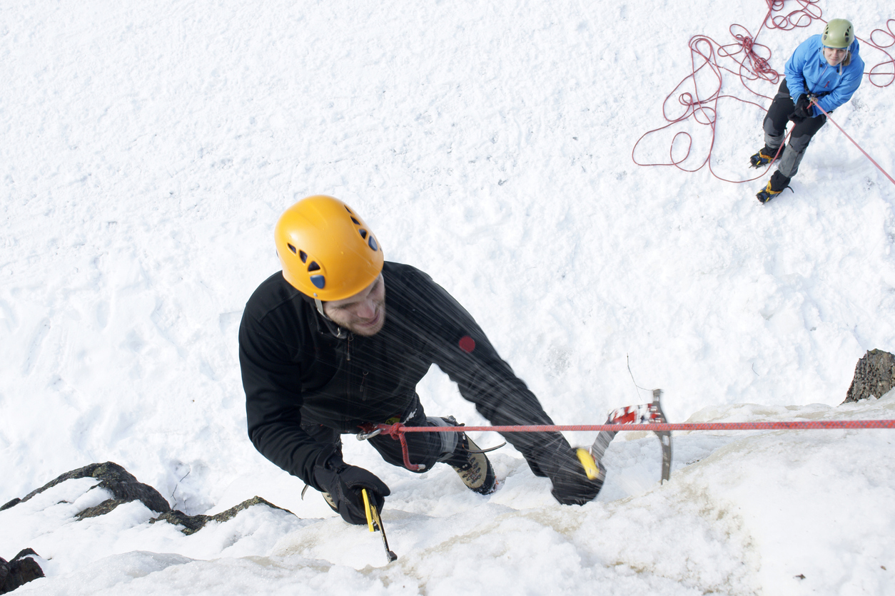 An ice climber climbing in the Aosta Valley
