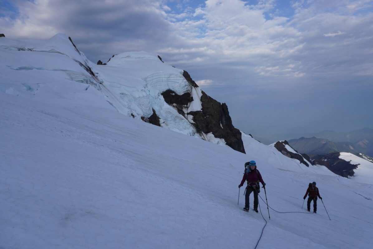 Some mountaineers climbing to the peak of Mount Baker