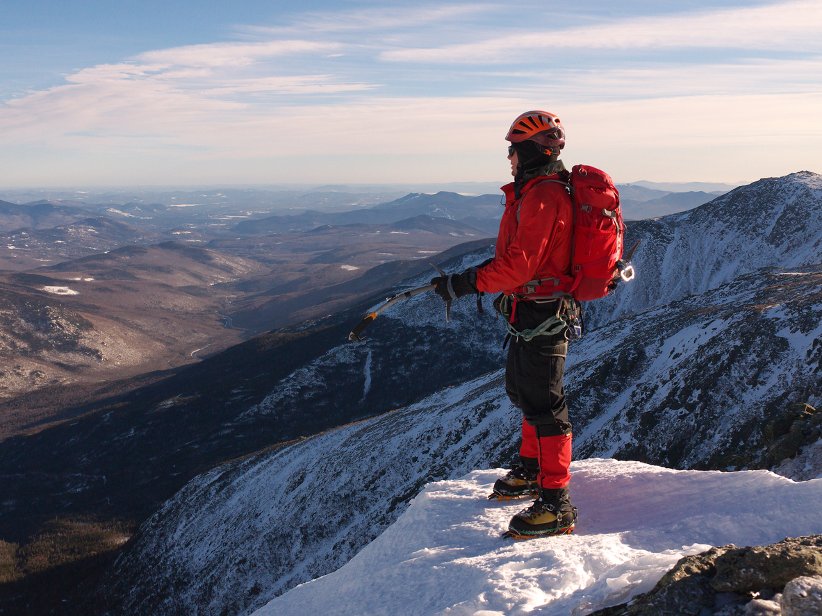 A climber in front of a vista in New Hampshire