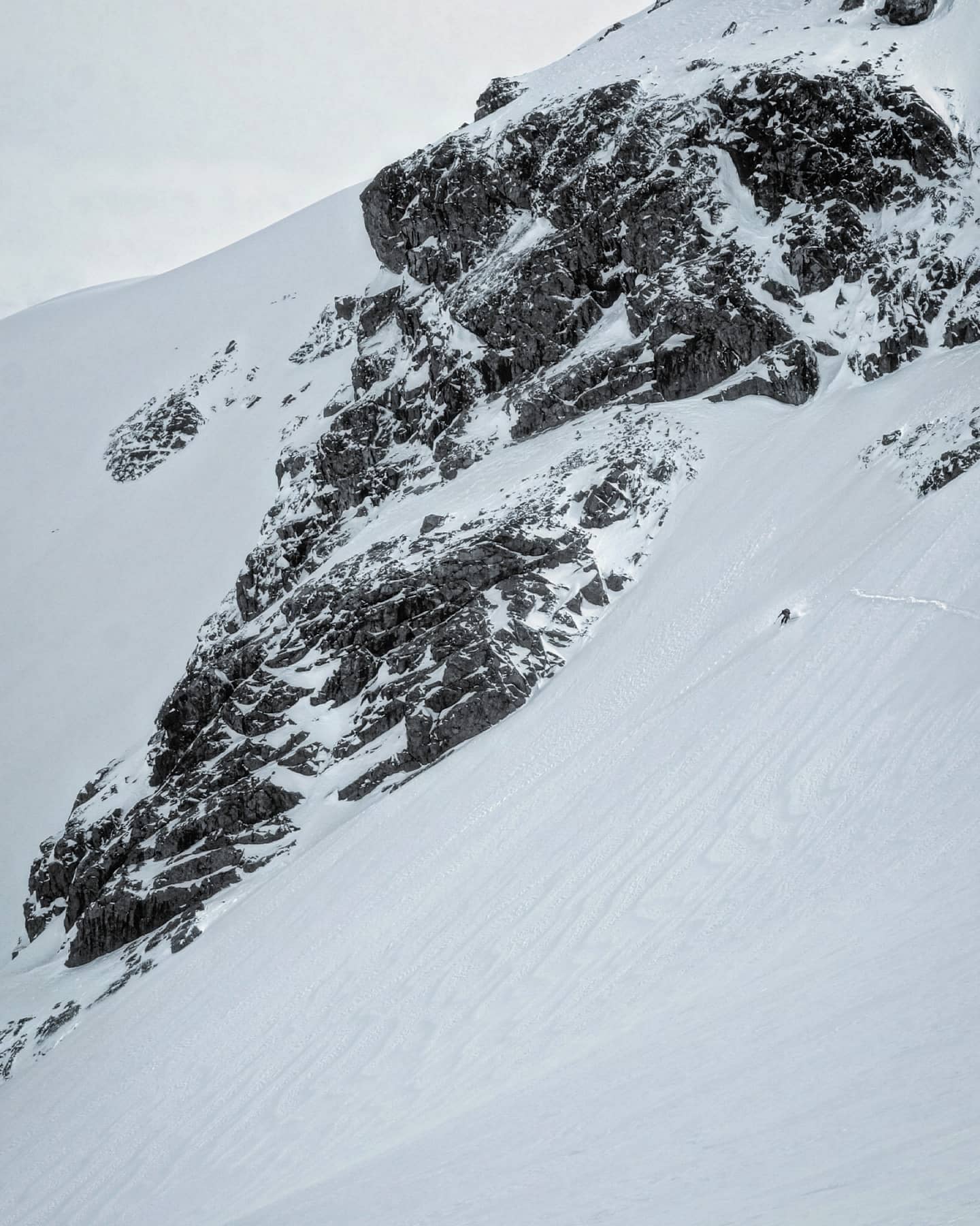 A slope and a backcountry skier in Lake Tahoe