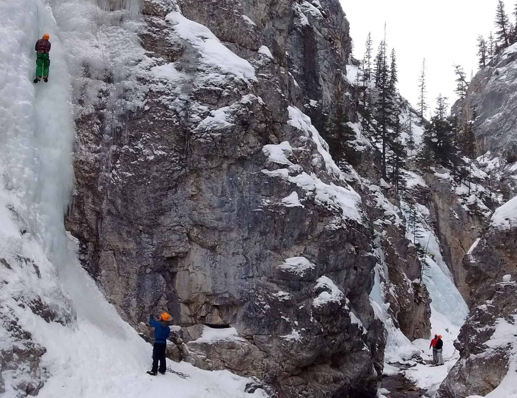An instructor and an ice climber in the Canadian Rockies