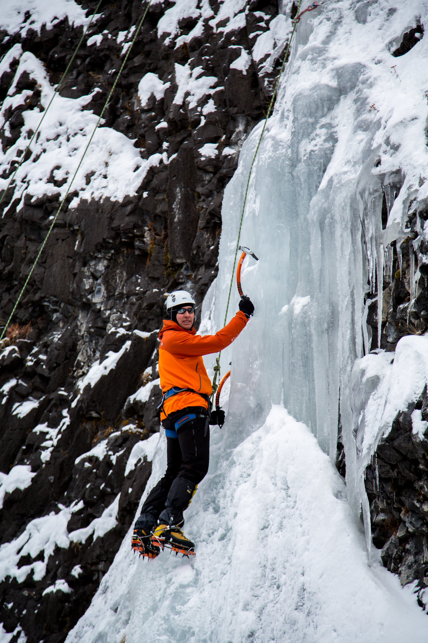 Ice climber on a frozen structure
