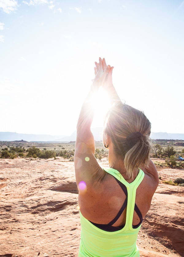 A woman practicing yoga in Indian Creek